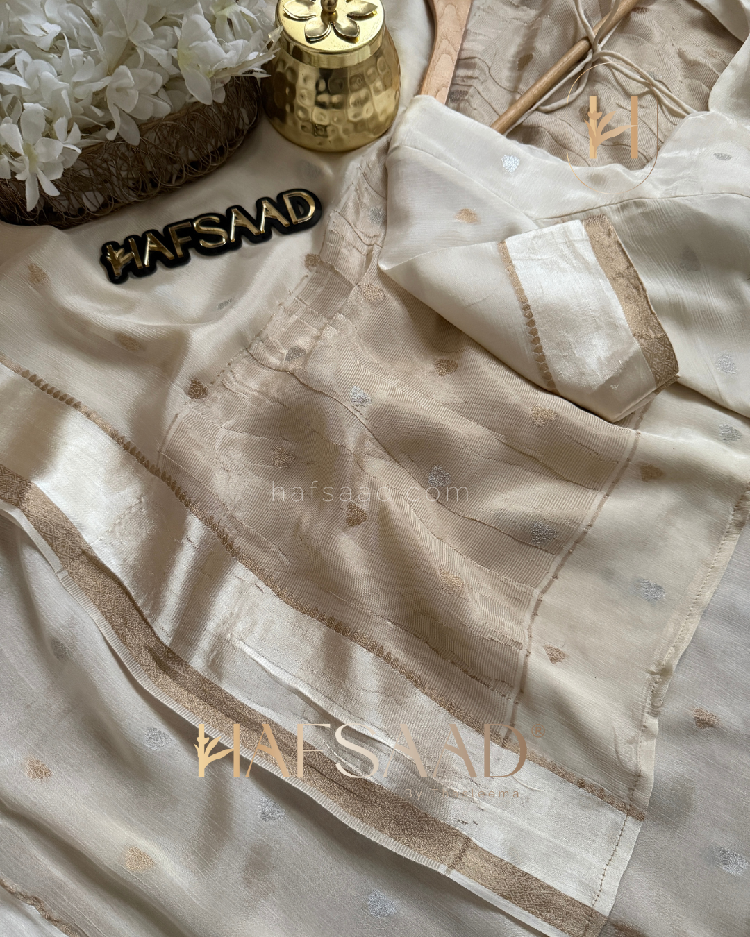 Tharini-Pure chinnon saree (Half white)