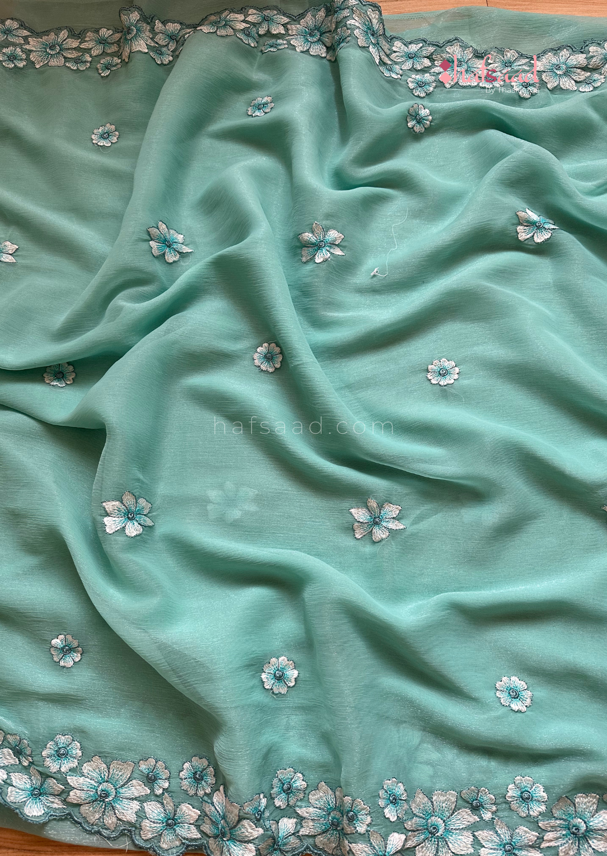 Ashwathy- soft floral chiffon saree (Tiffany Green)